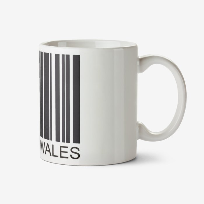 White mug with a black barcode and caption that reads Made In Wales