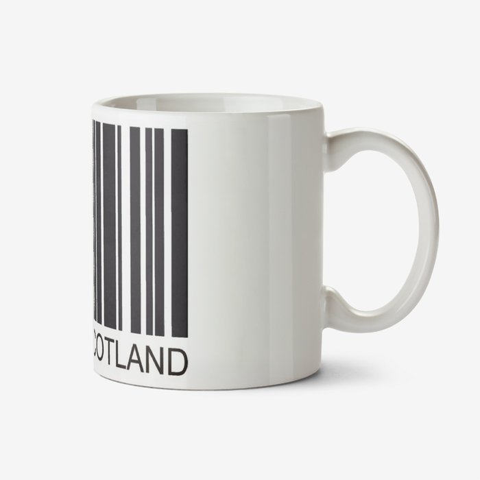 White mug with a black barcode and caption that reads Made In Scotland