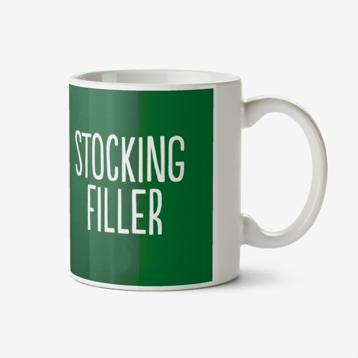 Green typographic mug with a caption that reads Stocking Filler