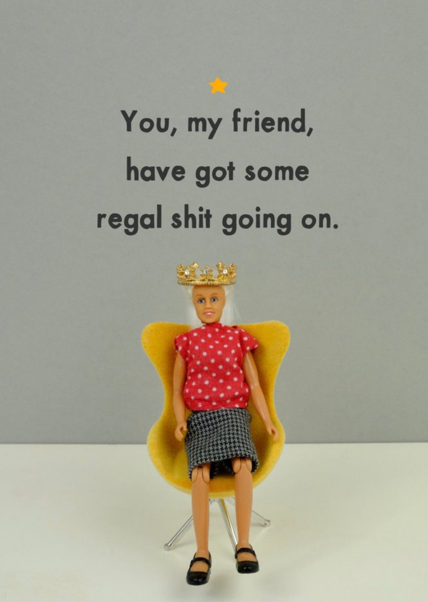 Bold And Bright Funny Photographic Image Of A Doll Sat In A Chair Wearing A Crown Regal Shit Going On Card Ecard