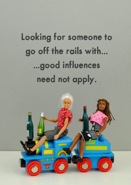 Funny Photographic Image Of Two Dolls Riding A Toy Train Whilst getting Drunk Off The Rails Card