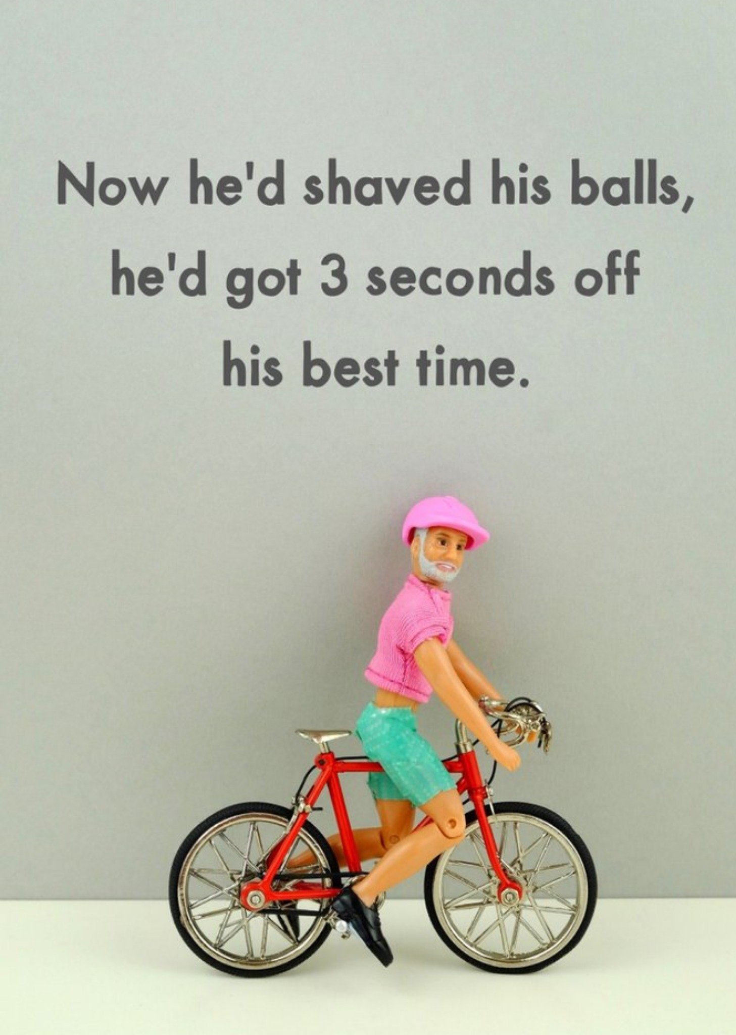 Bold And Bright Funny Photograph Of A Male Doll Riding A Bike Just To Say Card Ecard